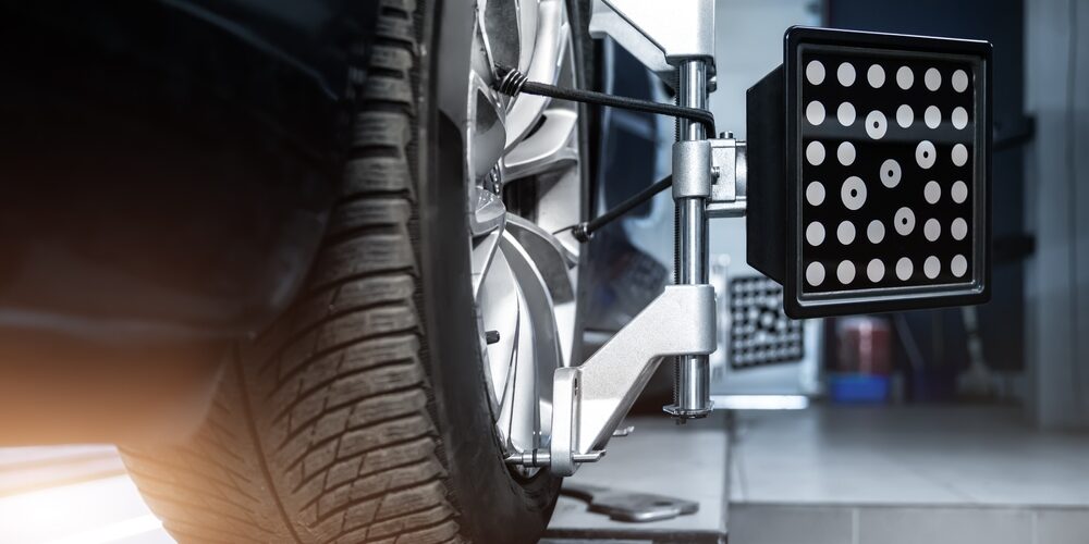 Close-up,Car,Wheel,Indoors,Service,Maintenance,Repair,Center,Against,Laser